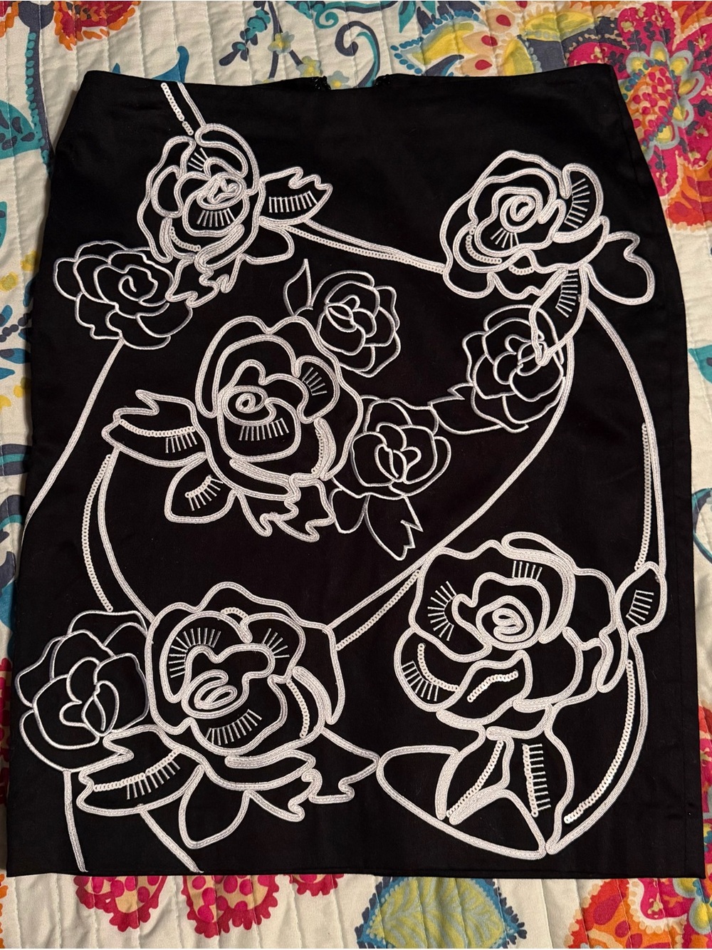 White House Black Market Black Satin Lined Skirt with embellished White Detail.